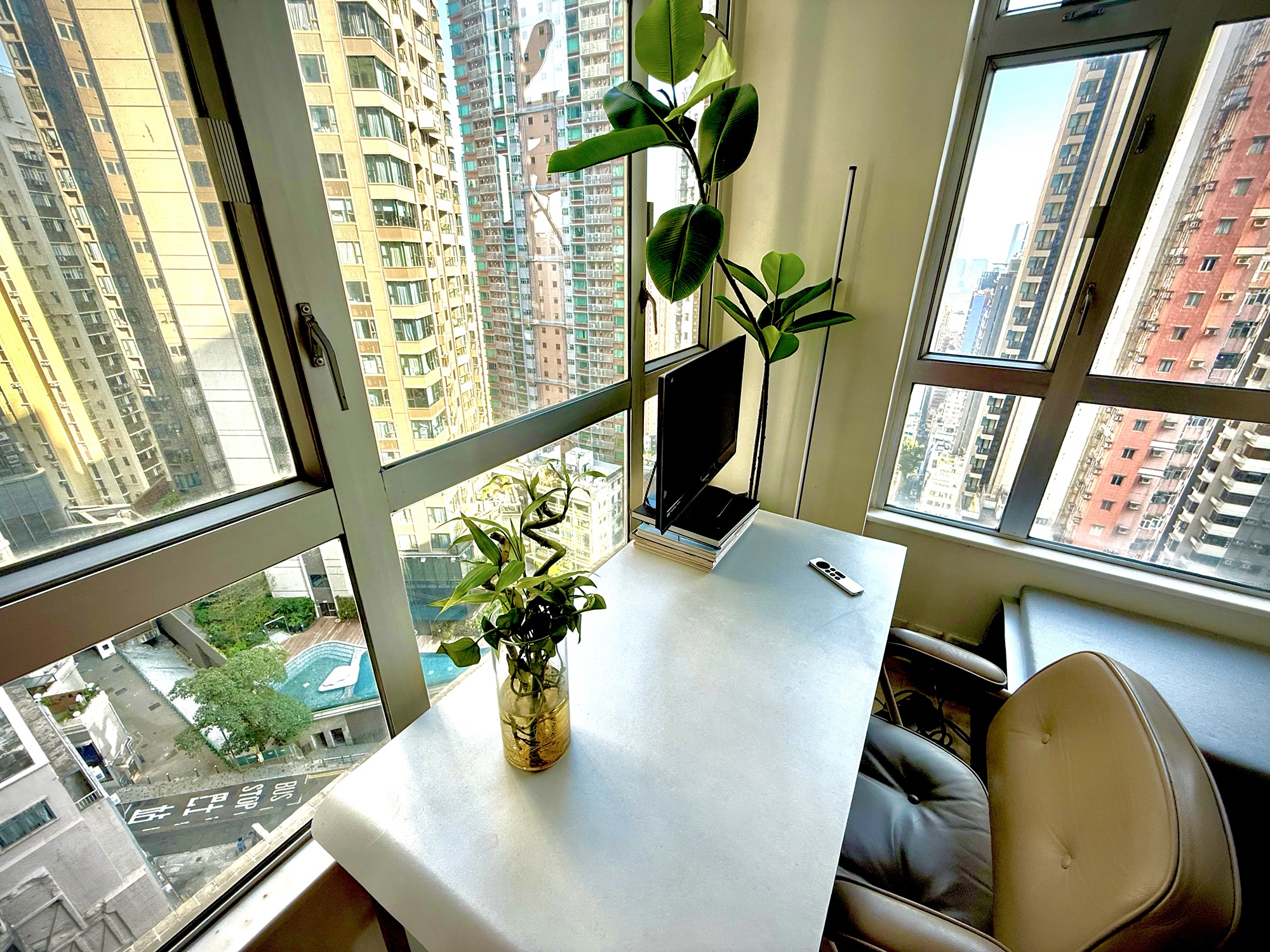 Desk overlooking Hong Kong buildings