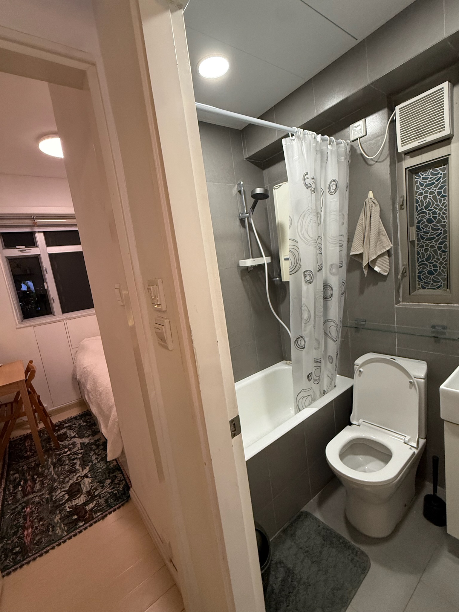 Bathroom with bathtub and shower