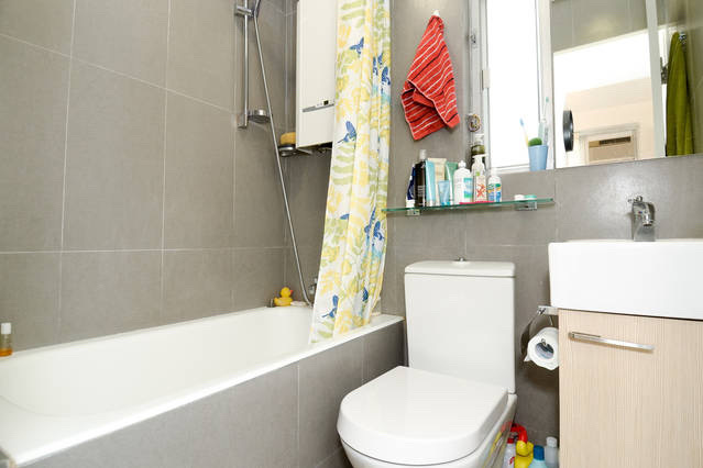 Bathroom with bathtub and vanity