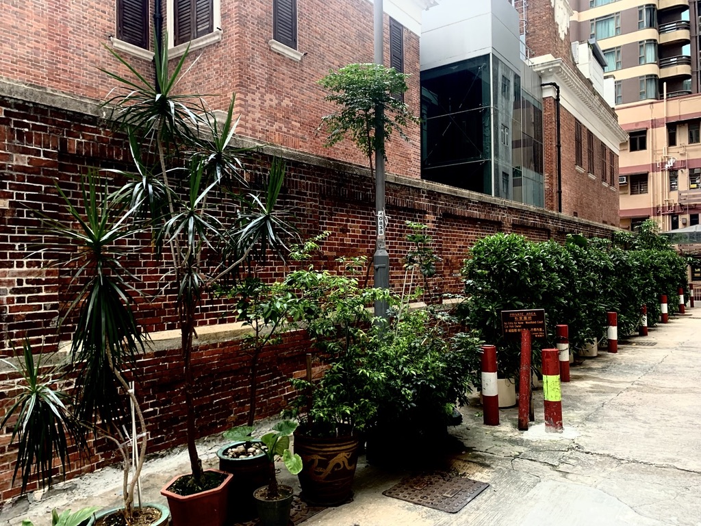 Brick-lined lane near the residence