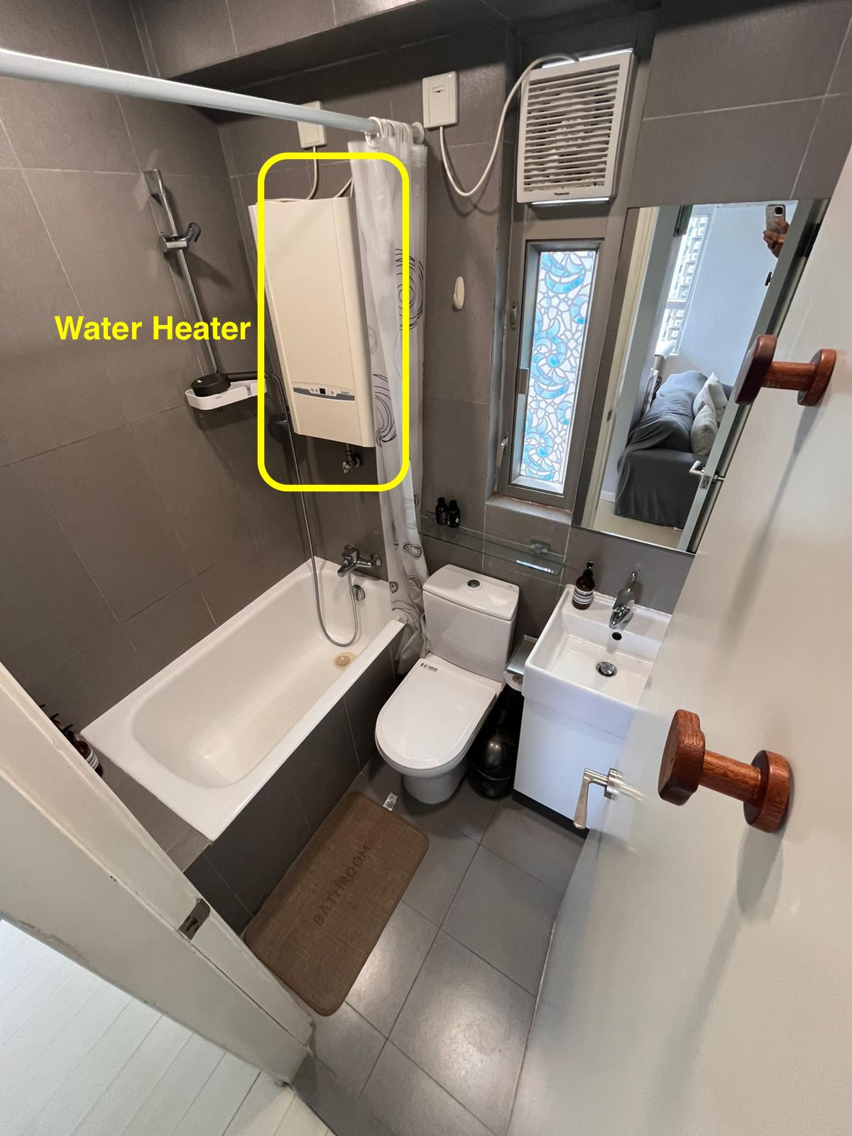 Bathroom water heater marked in yellow