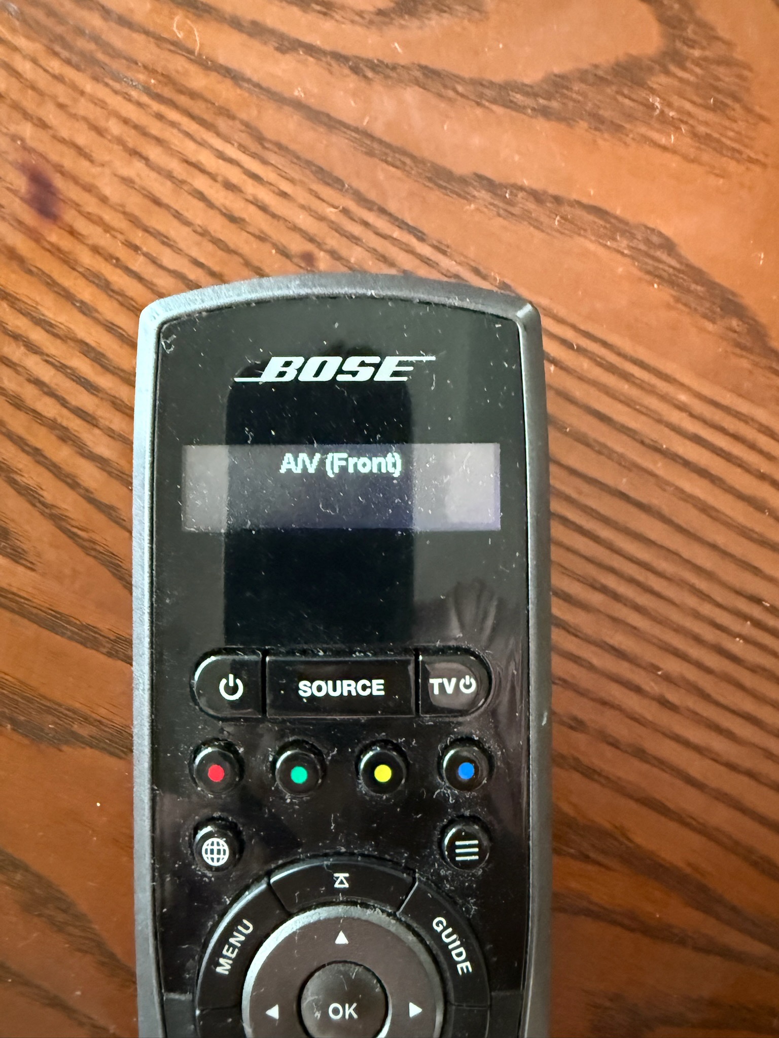 Close-up of the Bose remote showing Source and A/V Front