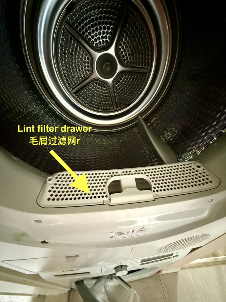 Lint-filter drawer inside the dryer door