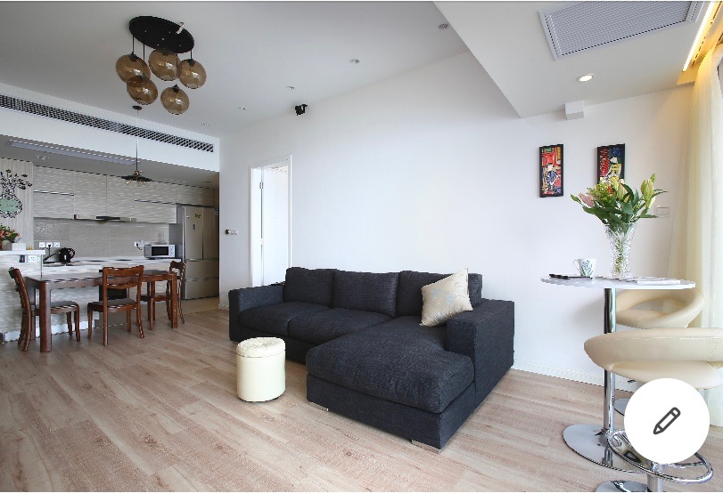 Living room facing the kitchen
