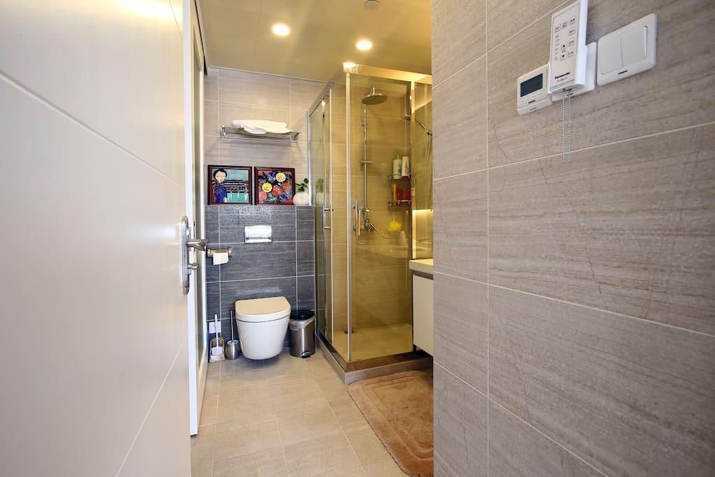 Bathroom with glass shower and toilet