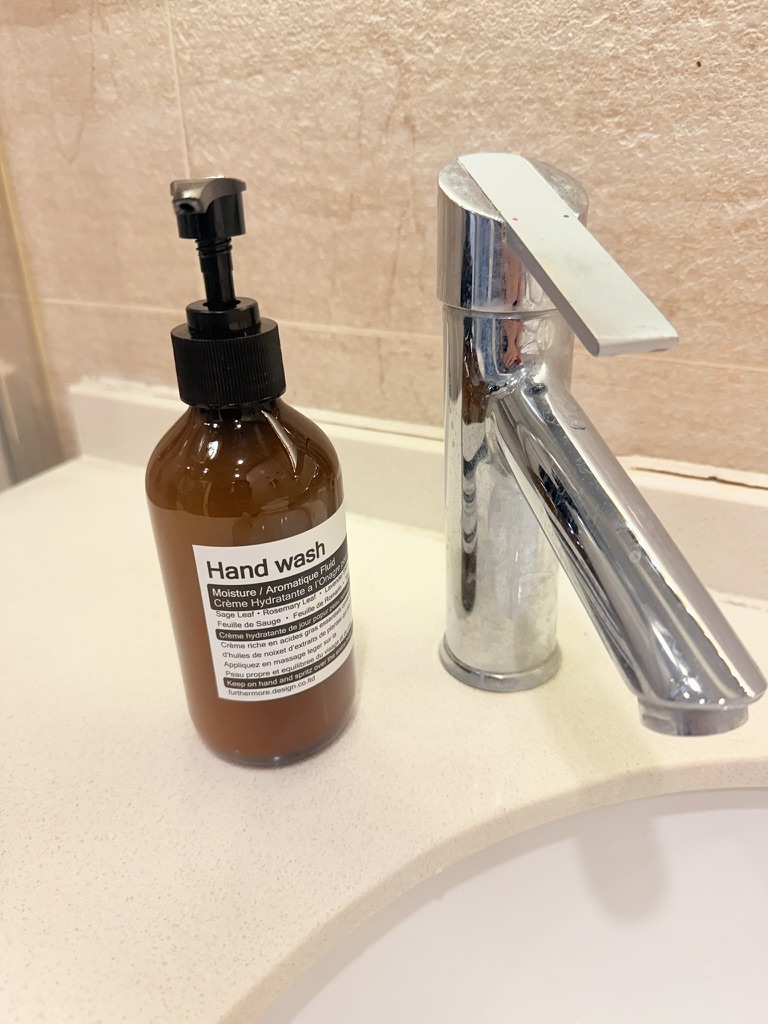 Bathroom sink with hand wash